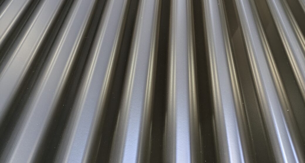 Corrugated steel cladding